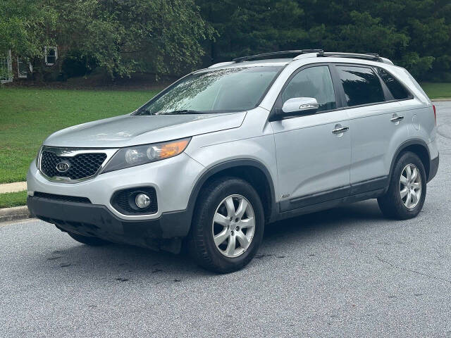 2012 Kia Sorento for sale at SHURE AUTO SALES in Snellville, GA