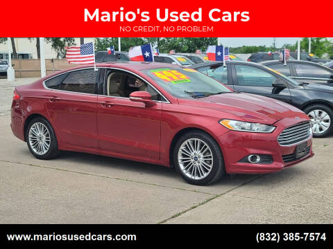 2014 Ford Fusion for sale at Mario's Used Cars in Houston TX