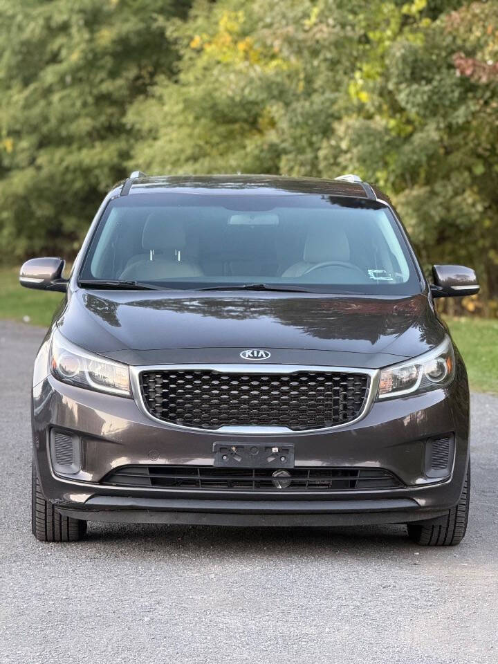 2015 Kia Sedona for sale at Town Auto Inc in Clifton Park, NY