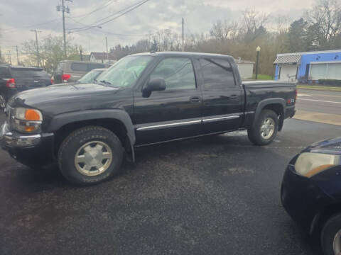 2005 GMC Sierra 1500 for sale at Maximum Auto Group II INC in Cortland OH