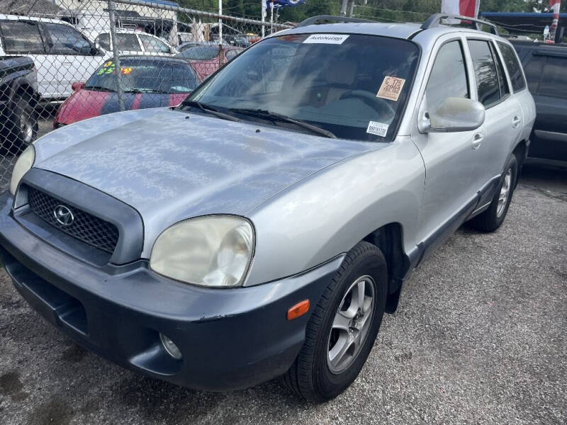 2004 Hyundai Santa Fe for sale at SCOTT HARRISON MOTOR CO in Houston TX