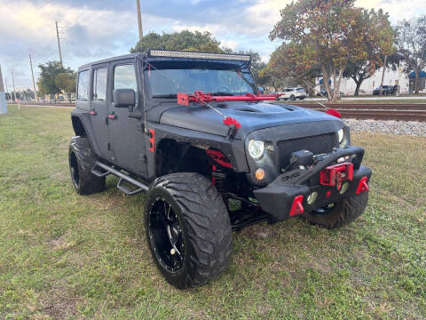 2016 Jeep Wrangler Unlimited for sale at UNITED AUTO BROKERS in Hollywood FL