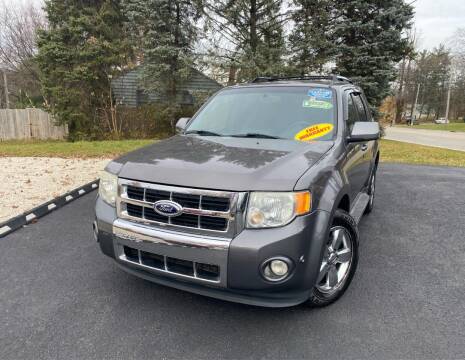 2012 Ford Escape for sale at DISTINCT AUTO GROUP LLC in Kent OH