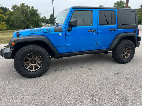 2015 Jeep Wrangler Unlimited for sale at Absolute Auto Deals in Barnhart MO