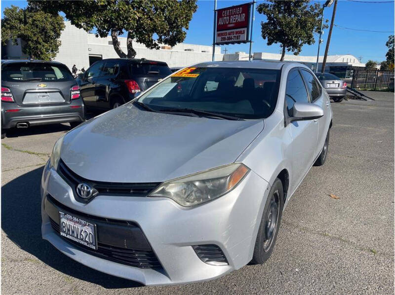 2015 Toyota Corolla for sale at MERCED AUTO WORLD in Merced CA