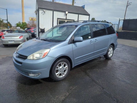 2004 Toyota Sienna for sale at McManus Motors in Wheat Ridge CO
