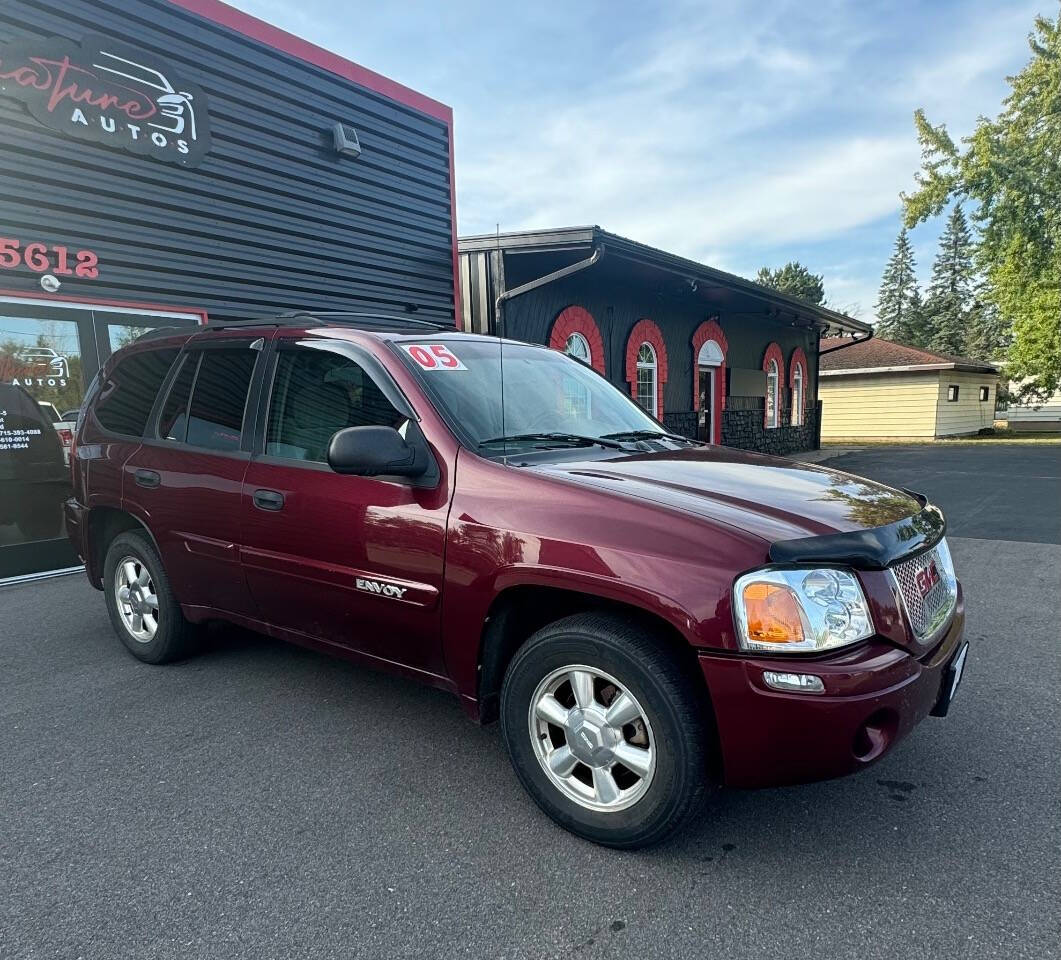 2005 GMC Envoy for sale at SIGNATURE AUTOS LLC in Weston, WI