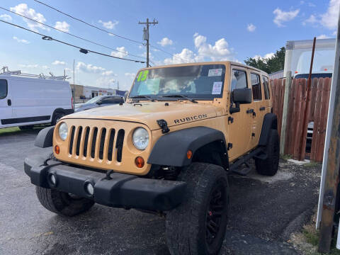 2013 Jeep Wrangler Unlimited for sale at Dallas Auto Drive in Dallas TX