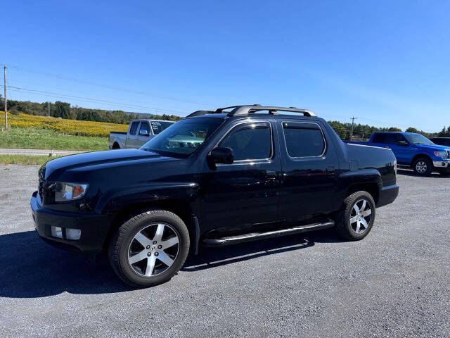 2014 Honda Ridgeline for sale at Riverside Motors in Glenfield, NY