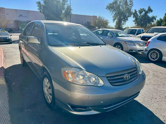 2003 Toyota Corolla for sale at HUDSONS AUTOS in Gilbert, AZ