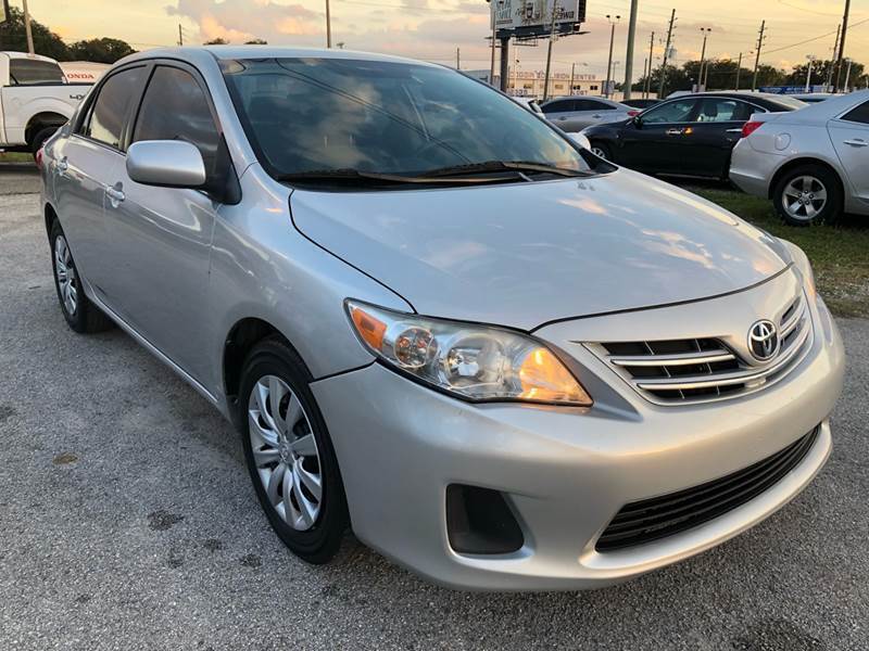 2013 Toyota Corolla for sale at Marvin Motors in Kissimmee FL