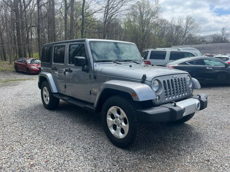 Used 2014 Jeep Wrangler Unlimited Sahara with VIN 1C4BJWEG4EL230547 for sale in Warrensville Heights, OH