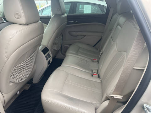 2011 Cadillac SRX for sale at HEDGES USED CARS in Carleton MI