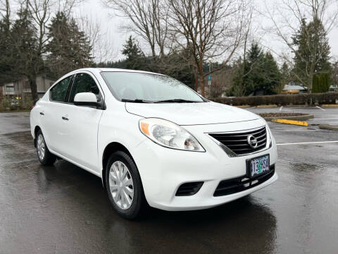 2014 Nissan Versa for sale at J.E.S.A. Karz in Portland OR