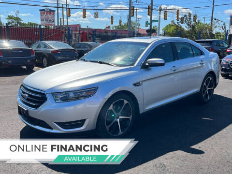 2015 Ford Taurus for sale at SKYLINE AUTO in Detroit MI