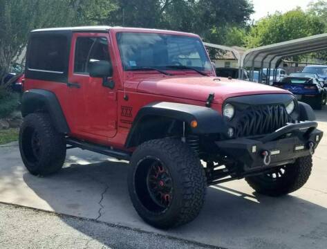2014 Jeep Wrangler for sale at CE Auto Sales in Baytown TX