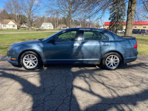 2011 Ford Fusion for sale at Bowlings Used Cars in Canton OH