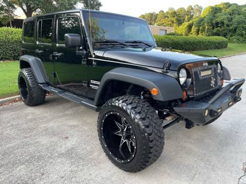 2013 Jeep Wrangler Unlimited for sale at United Luxury Motors in Stone Mountain GA