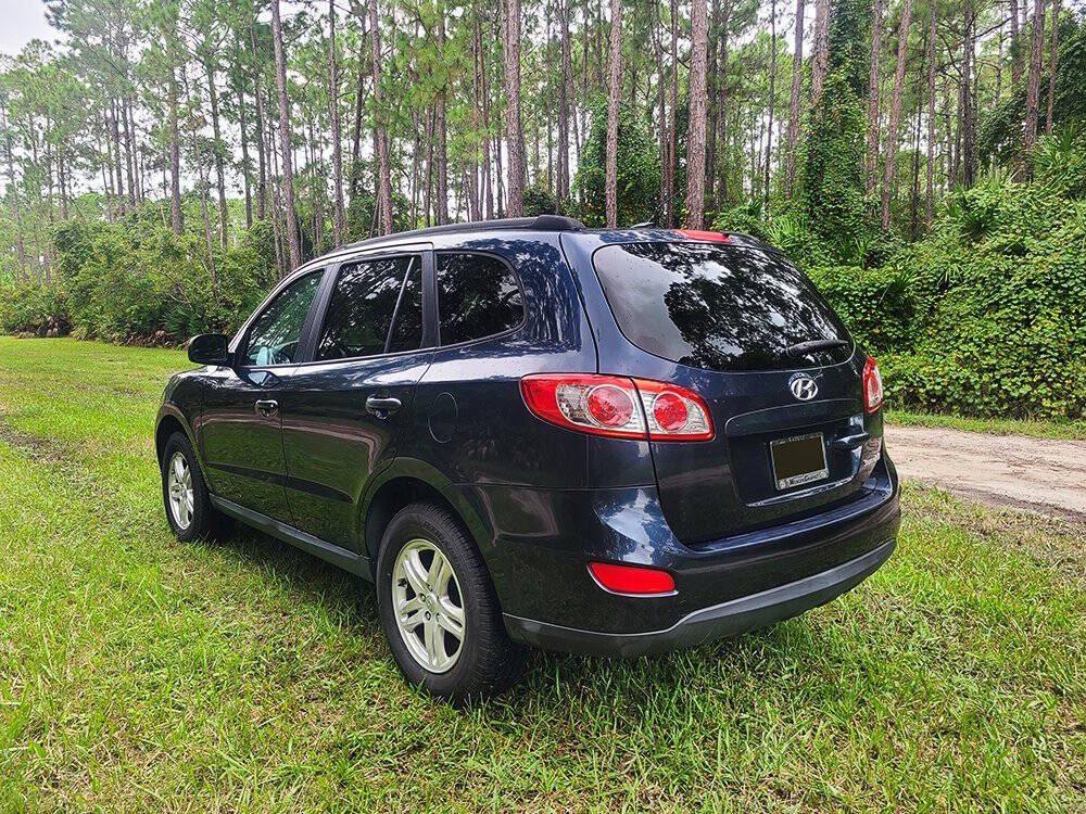 2011 Hyundai SANTA FE for sale at Flagler Auto Center in Bunnell, FL