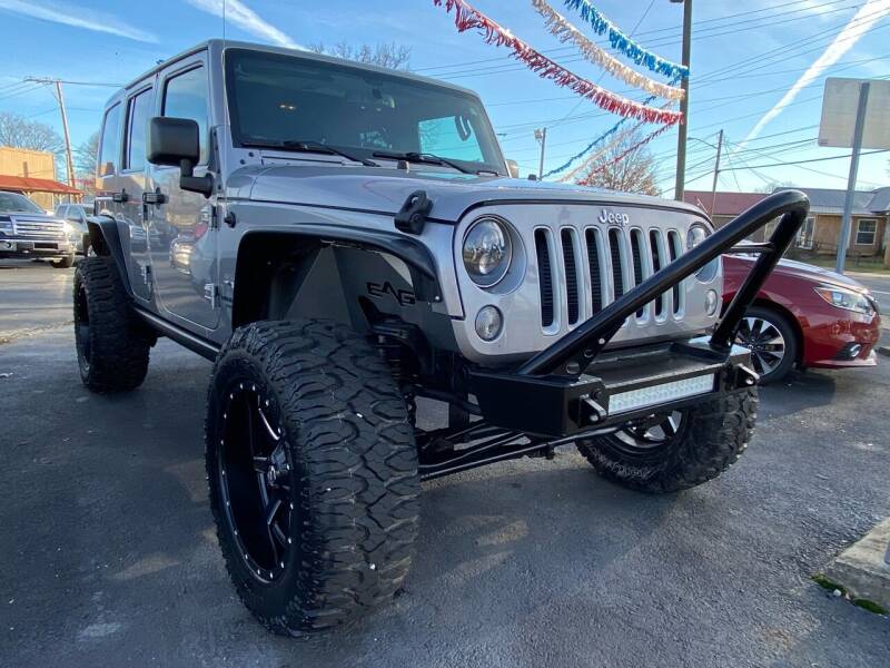 2016 Jeep Wrangler Unlimited for sale at Auto Exchange in The Plains OH