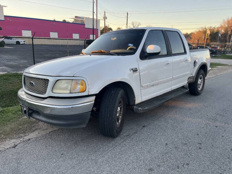 2001 Ford F-150 for sale at SCOTT HARRISON MOTOR CO in Houston TX