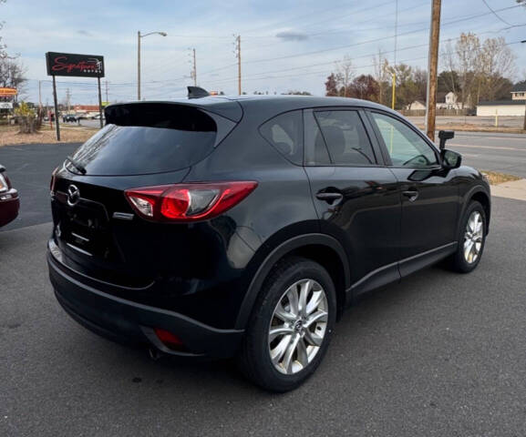 2015 Mazda CX-5 for sale at SIGNATURE AUTOS LLC in Weston, WI