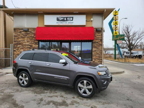 2014 Jeep Grand Cherokee for sale at 719 Automotive Group in Colorado Springs CO