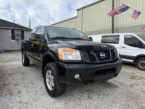 2010 Nissan Titan for sale at CHEAPIE AUTO SALES INC in Metairie LA