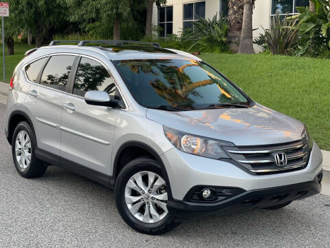 2013 Honda CR-V for sale at MILLENNIUM MOTORS in Van Nuys CA