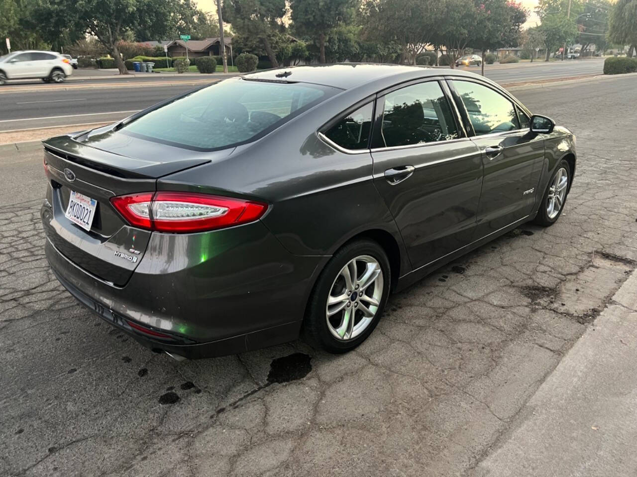 2016 Ford Fusion Hybrid for sale at AUTO 4 LESS in Fresno, CA