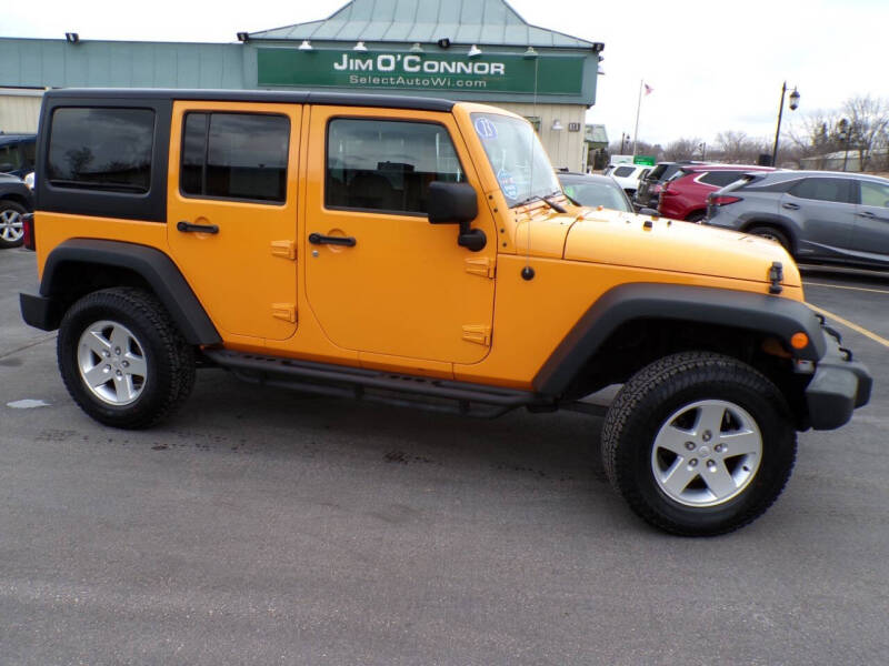 2013 Jeep Wrangler Unlimited for sale at Jim O'Connor Select Auto in Oconomowoc WI