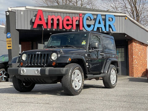 2012 Jeep Wrangler for sale at AMERICAR INC in Laurel MD