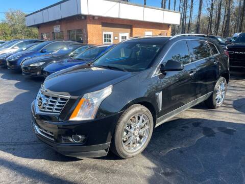 2013 Cadillac SRX for sale at Magic Motors Inc. in Snellville GA