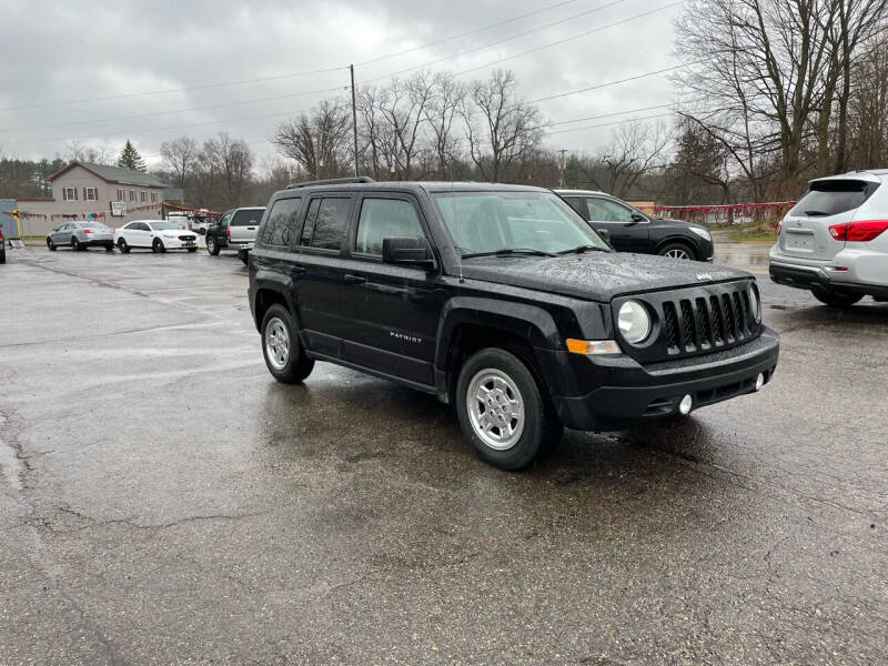 2015 Jeep Patriot for sale at Rombaugh's Auto Sales in Battle Creek MI