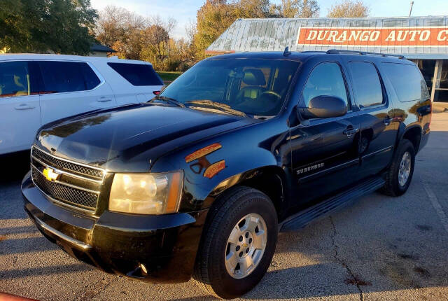 2012 Chevrolet Suburban for sale at DURANGO AUTO CENTER LLC in Tulsa, OK