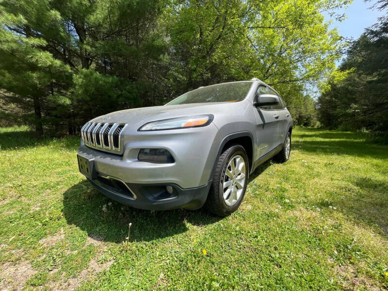 2014 Jeep Cherokee for sale at Rombaugh's Auto Sales in Battle Creek MI