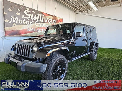 2015 Jeep Wrangler Unlimited for sale at SULLIVAN MOTOR COMPANY INC. in Mesa AZ