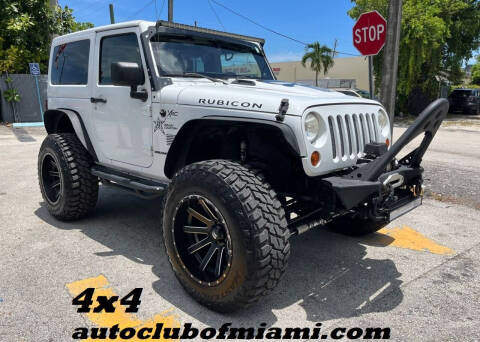 2013 Jeep Wrangler for sale at AUTO CLUB OF MIAMI, INC in Miami FL