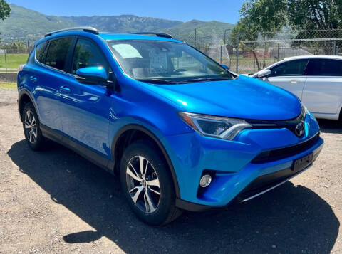 2017 Toyota RAV4 for sale at The Car-Mart in Bountiful UT