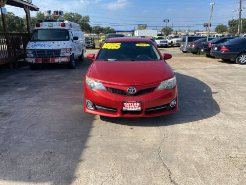 2014 Toyota Camry for sale at Taylor Trading Co in Beaumont TX