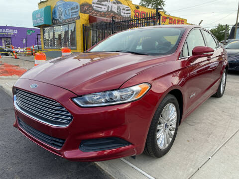 2014 Ford Fusion Hybrid for sale at Dollar Daze Auto Sales Inc in Detroit MI