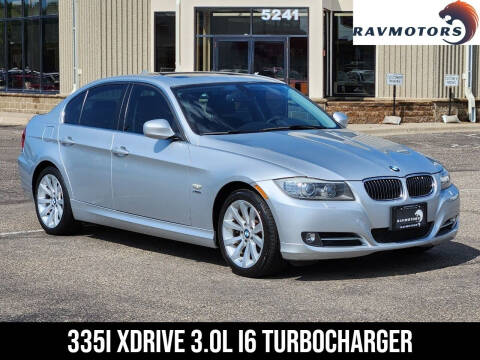 2011 BMW 3 Series for sale at RAVMOTORS - CRYSTAL in Crystal MN