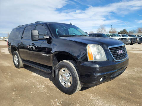 2013 GMC Yukon XL for sale at BERKENKOTTER MOTORS in Brighton CO