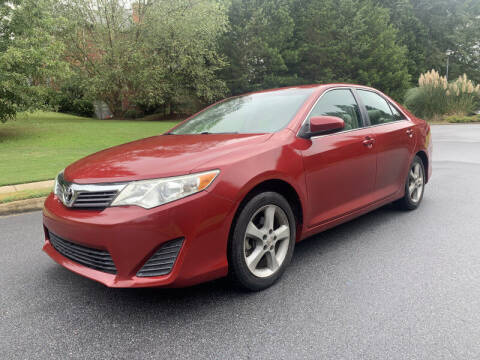 2013 Toyota Camry for sale at SHURE AUTO SALES in Snellville GA
