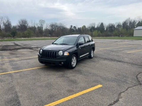 2010 Jeep Compass for sale at Caruzin Motors in Flint MI