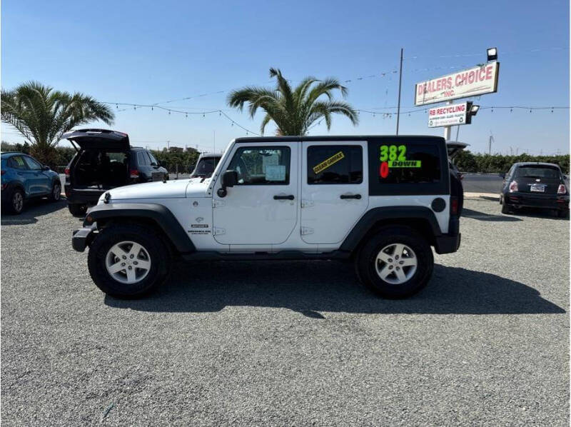 2016 Jeep Wrangler Unlimited for sale at Dealers Choice Inc in Farmersville CA