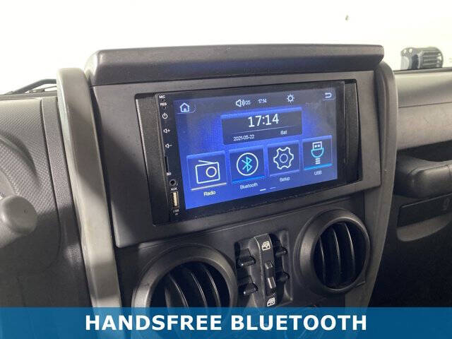 Used 2010 Jeep Wrangler Unlimited Sport with VIN 1J4BA3H12AL118582 for sale in Alliance, OH