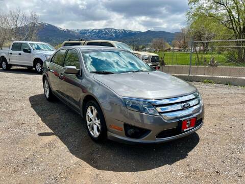 2012 Ford Fusion for sale at The Car-Mart in Bountiful UT