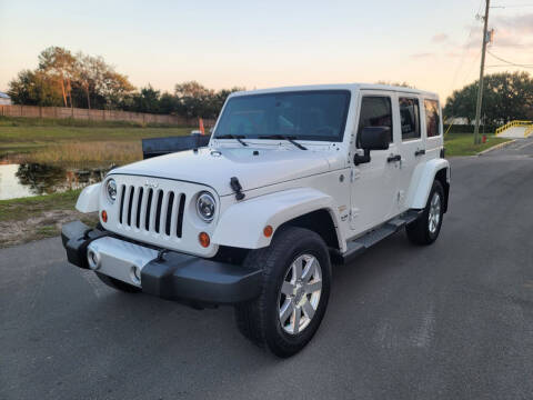 2013 Jeep Wrangler Unlimited for sale at Carcoin Auto Sales in Orlando FL