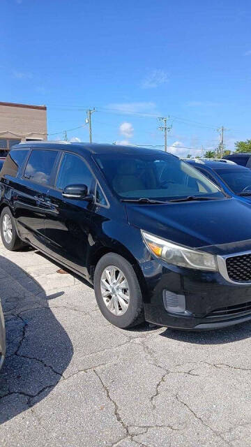 2015 Kia Sedona for sale at OUT SHINE AUTO SALES LLC in Port Charlotte, FL